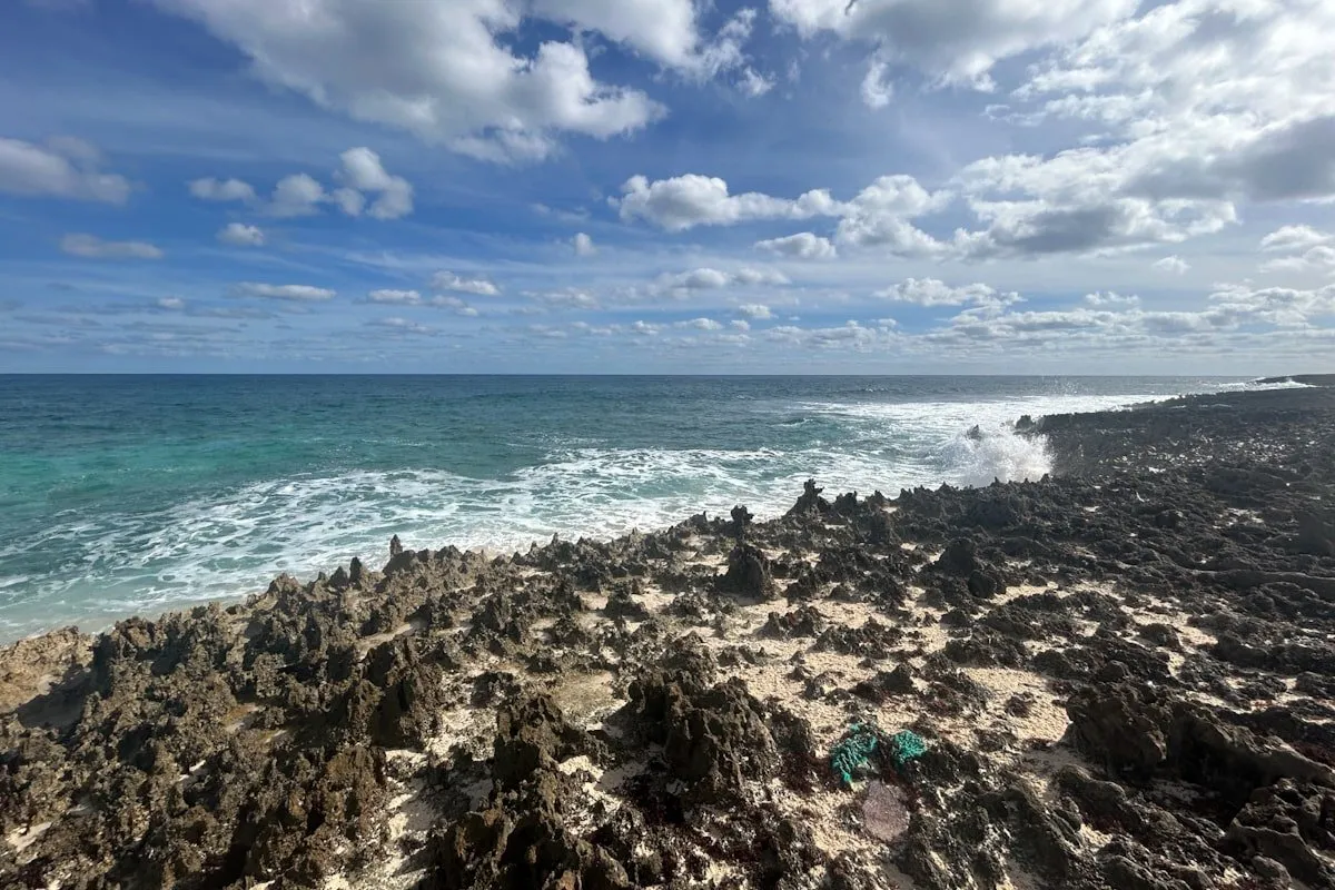 Lynyard Cay with white foam on water