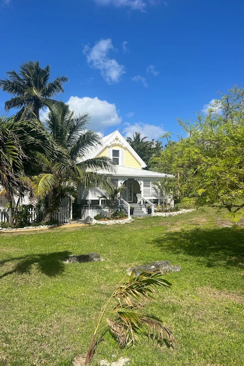 yellow clapboard house Hopetown Bahamas